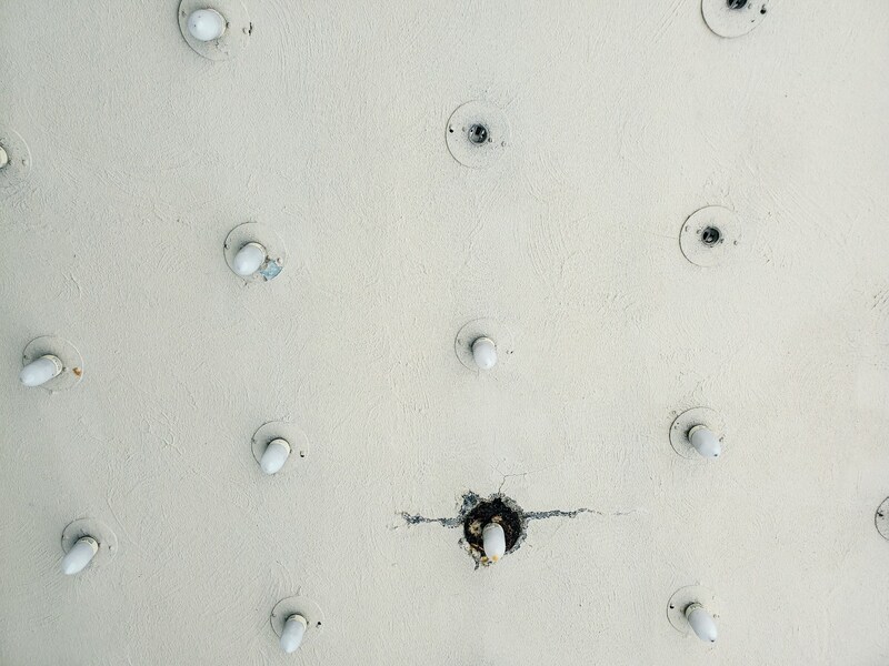 How to repair drywall anchor holes correctly?