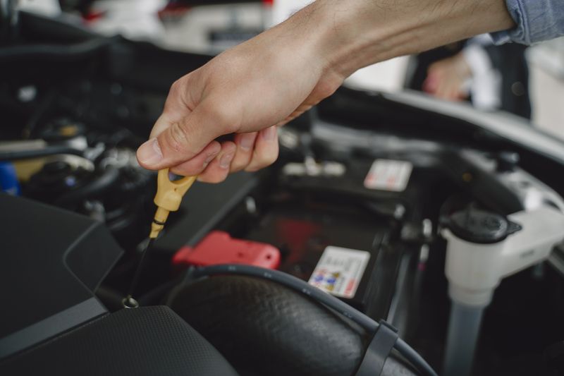How to check oil level in car with a dipstick